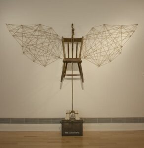The Ascending - Air-dry clay, rope, vintage hook, twine, found chair, found metal box, paint , dimensions variable, 2012